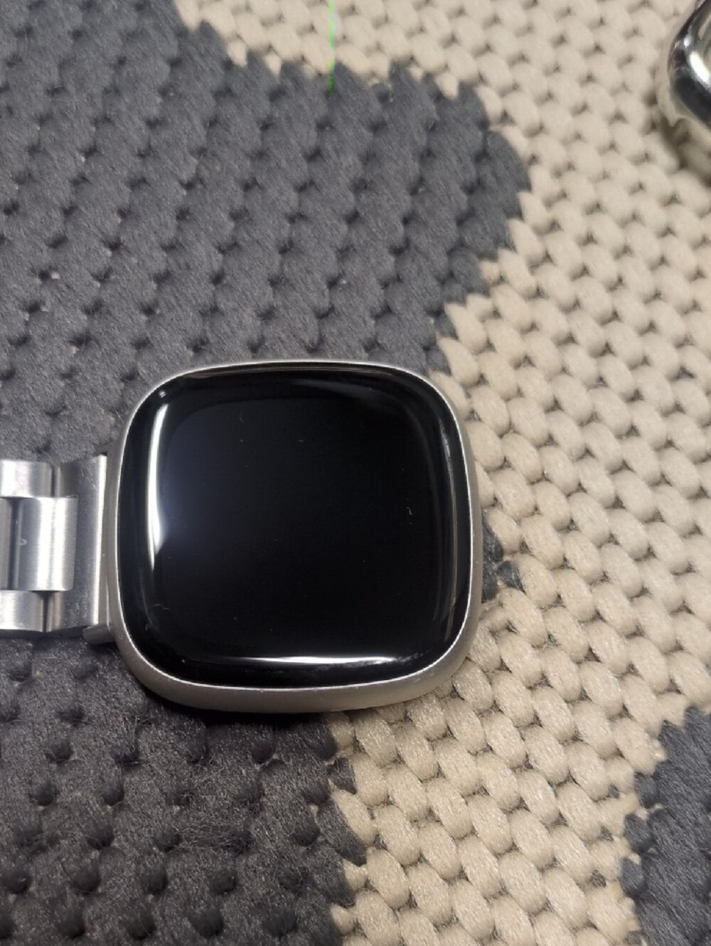 fitbit Versa 4 with Gray, Silver, Cream and Multicolor Bands - Picture 2 of 4